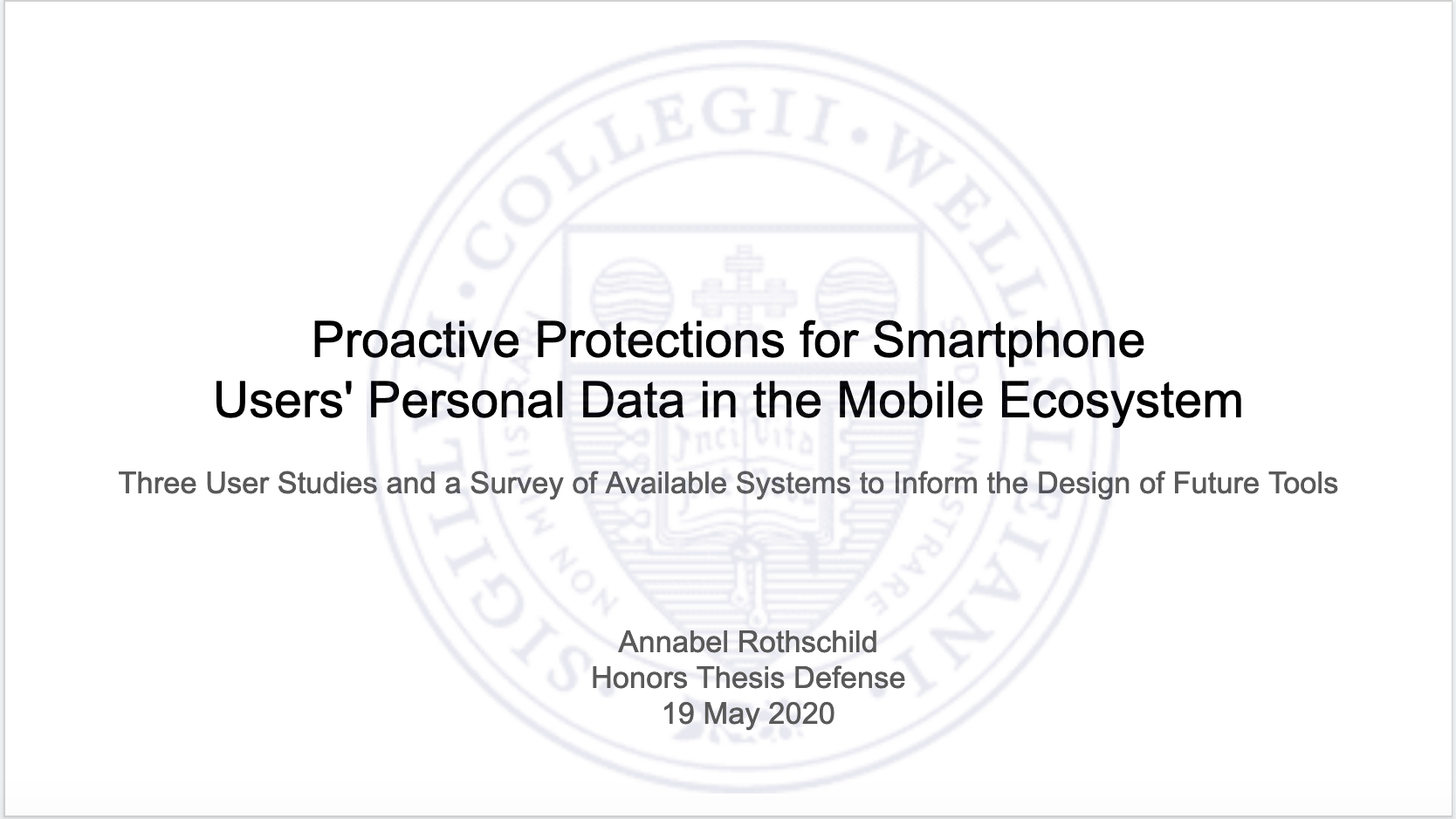 Photo of thesis defense slideshow showing title.
